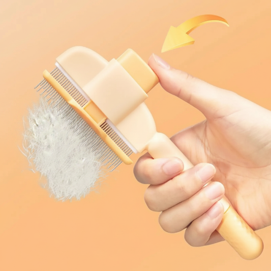 WagNestra Grooming Comb hero shot held in hand