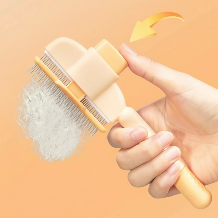 WagNestra Grooming Comb hero shot held in hand